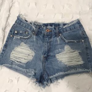 High wasted distressed shorts